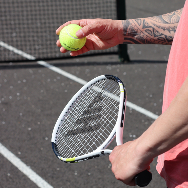 A Guy showing the Hit Sport Aluminium Tennis Racket