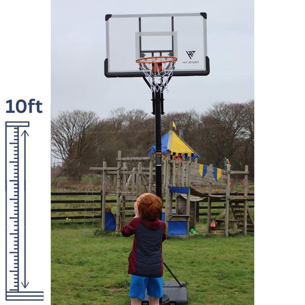 The Hit Sport 10ft Premium Adjustable Basketball Hoop Series 3 placed on a Playground and a child playing