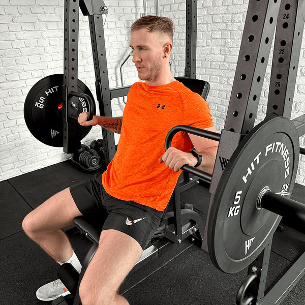 A Guy doing exercises using the Hit Fitness F200 Pro / Half Rack Jammer Arms