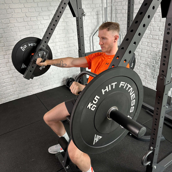 A Guy doing exercises using the Hit Fitness F200 Pro / Half Rack Jammer Arms
