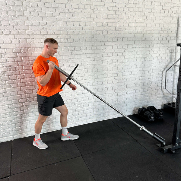 A Guy doing exercises using the Hit Fitness F200 Pro / Half Rack Landmine Attachment