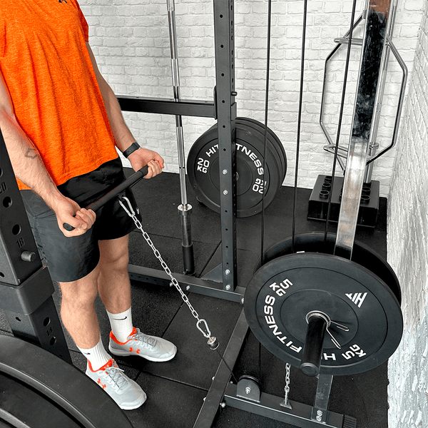 A Guy doing exercises using the Hit Fitness F200 Pro Power Rack Cable Pulley System