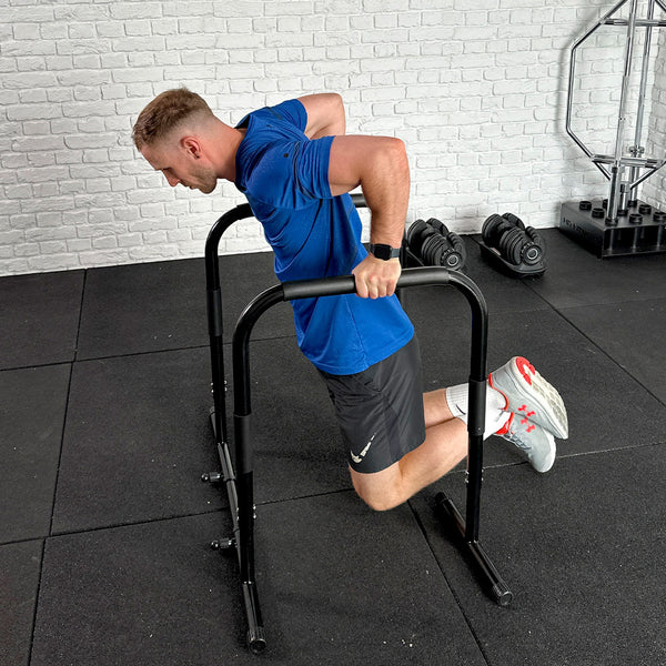 A Guy doing exercises using the Hit Fitness Parallel Dip & High Parallette Bars