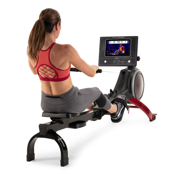 Woman using Proform PRO R10 Rower
