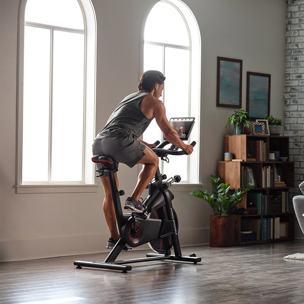 Man Using Proform Pro Trainer 500 Indoor Cycle