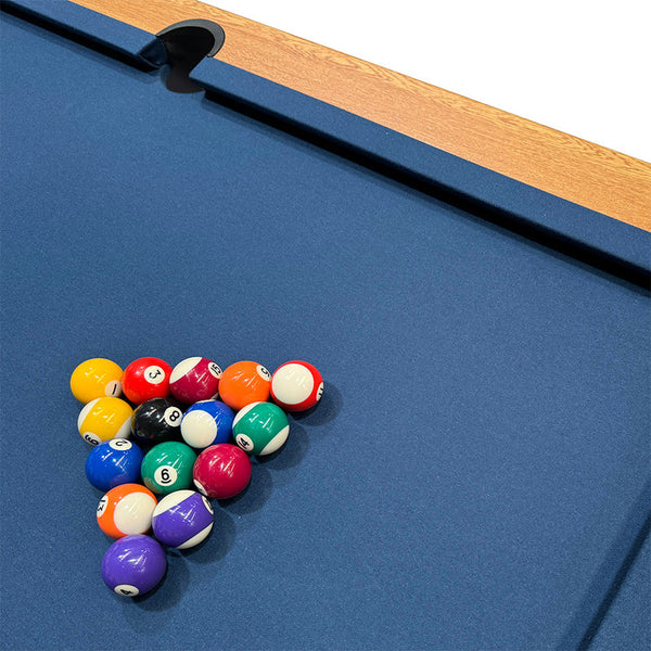 Pool balls arranged in a triangle on a blue pool table.