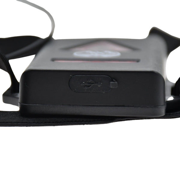 Close-up view of the charging port on the Six Peaks Running LED Chest Lamp battery pack.