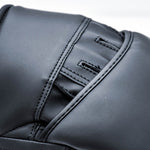 Close-up of the stitching and details on the Urban Fight Focus Mitts, showing the padded area and the secure design.