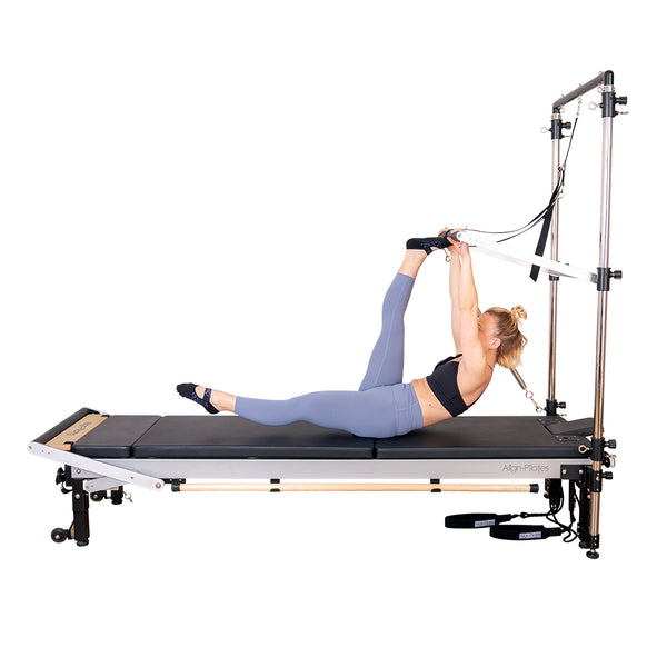 Hamstring stretches on a Align Pilates C8-Pro Studio Pilates Reformer