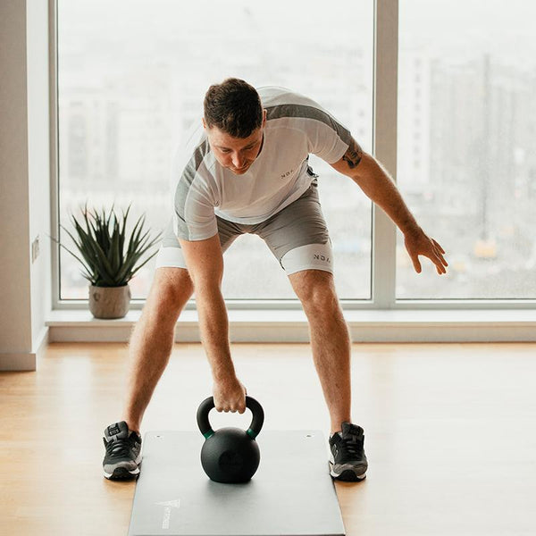 Hit Fitness Advanced Cast Iron Kettlebell Set | 16kg, 20kg and 24kg- Holding Kettlebell