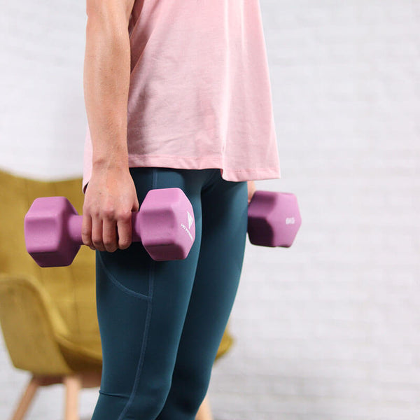 Woman exercising with Neoprene Dumbbells