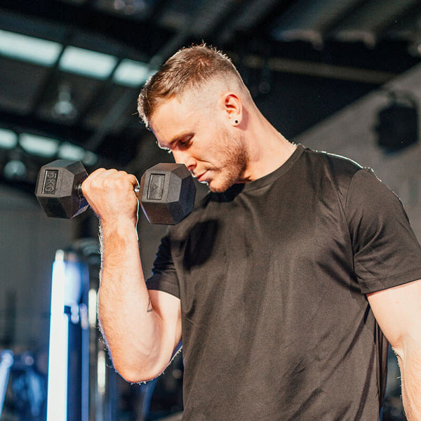 Hit Fitness Hex Dumbbells | 5kg - Man doing Curls