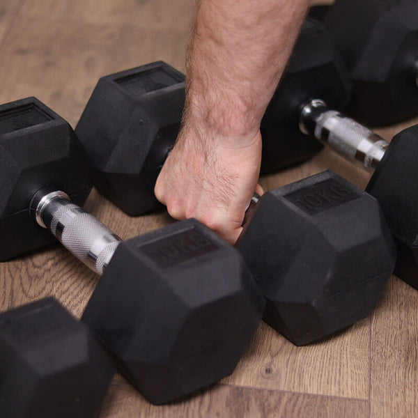 Hit Fitness Hex Dumbbells 5kg, 10kg & 15kg | Bundle - Man Grabbing Dumbbell