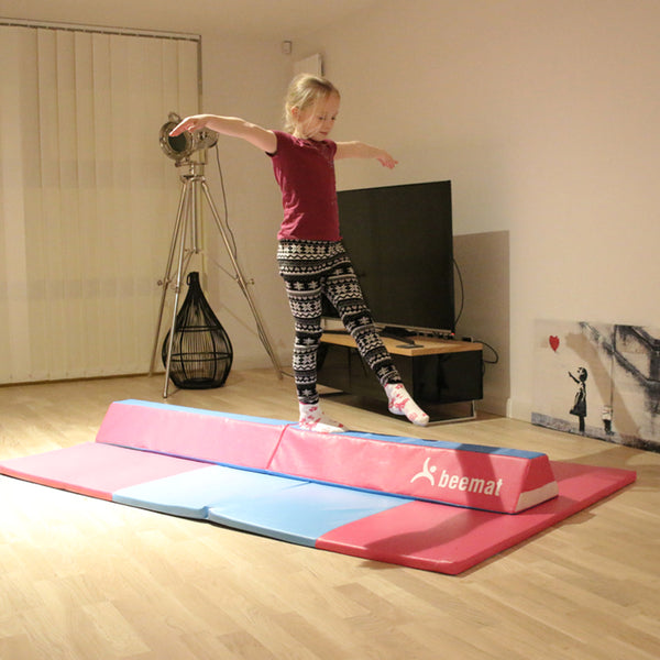 Girl walking on a Balance Beam